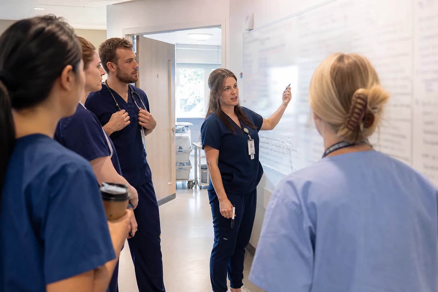 HR team completing pre-joining documentation and registration verification before a new hospital employee's first day