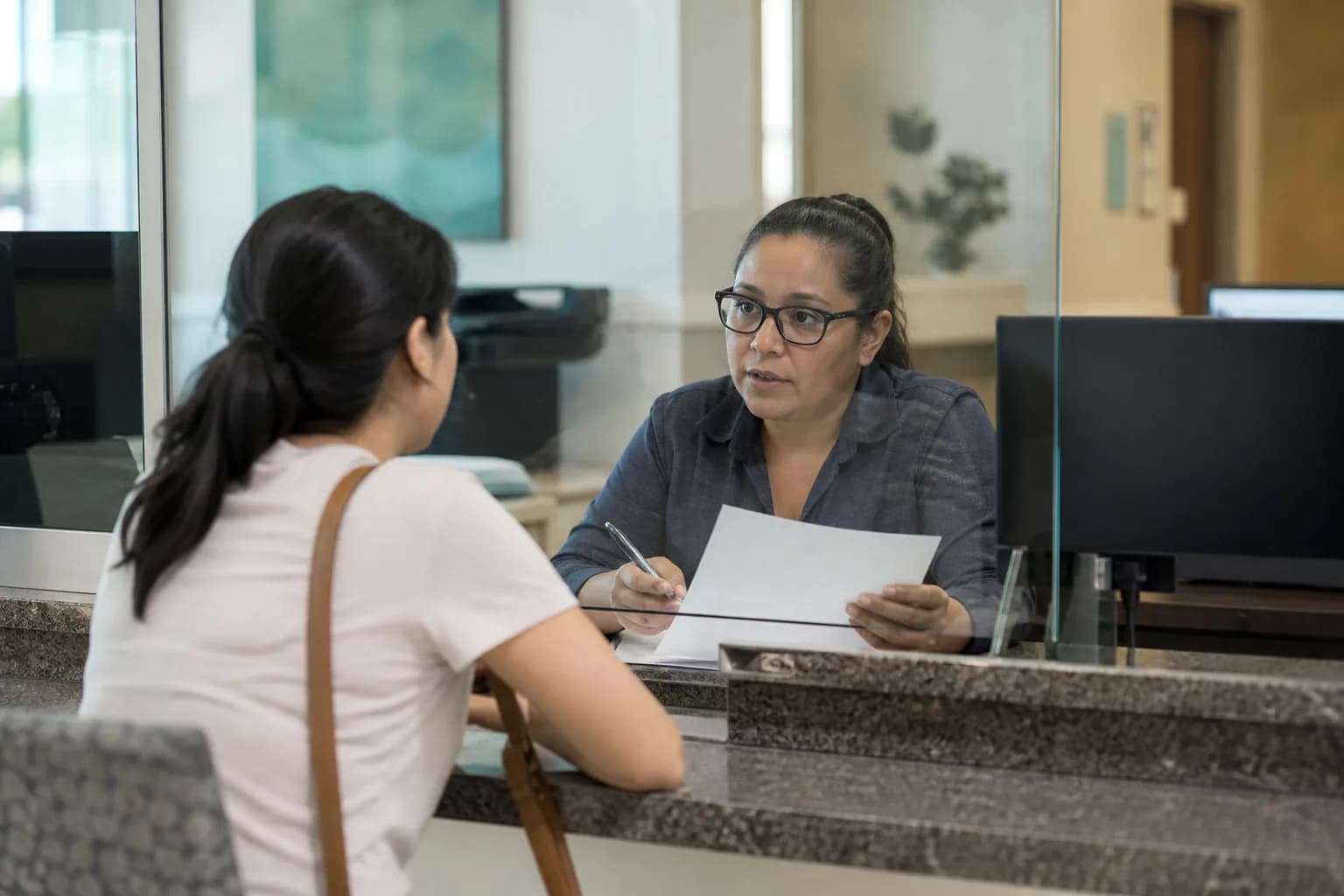 Monthly root-cause review bringing finance and clinical leads together over denial categories